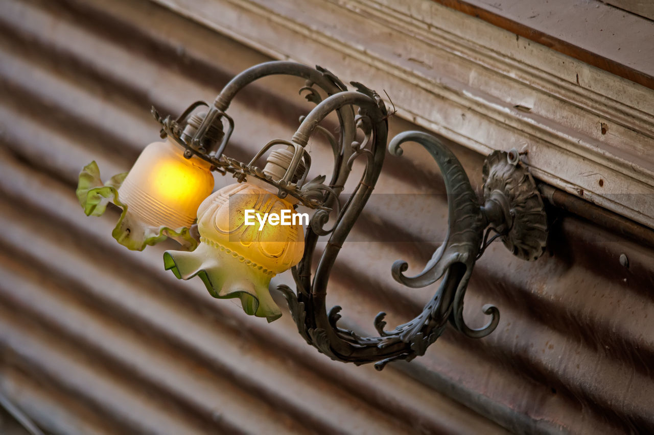 metal, iron, no people, lighting, yellow, close-up, hanging, indoors, architecture