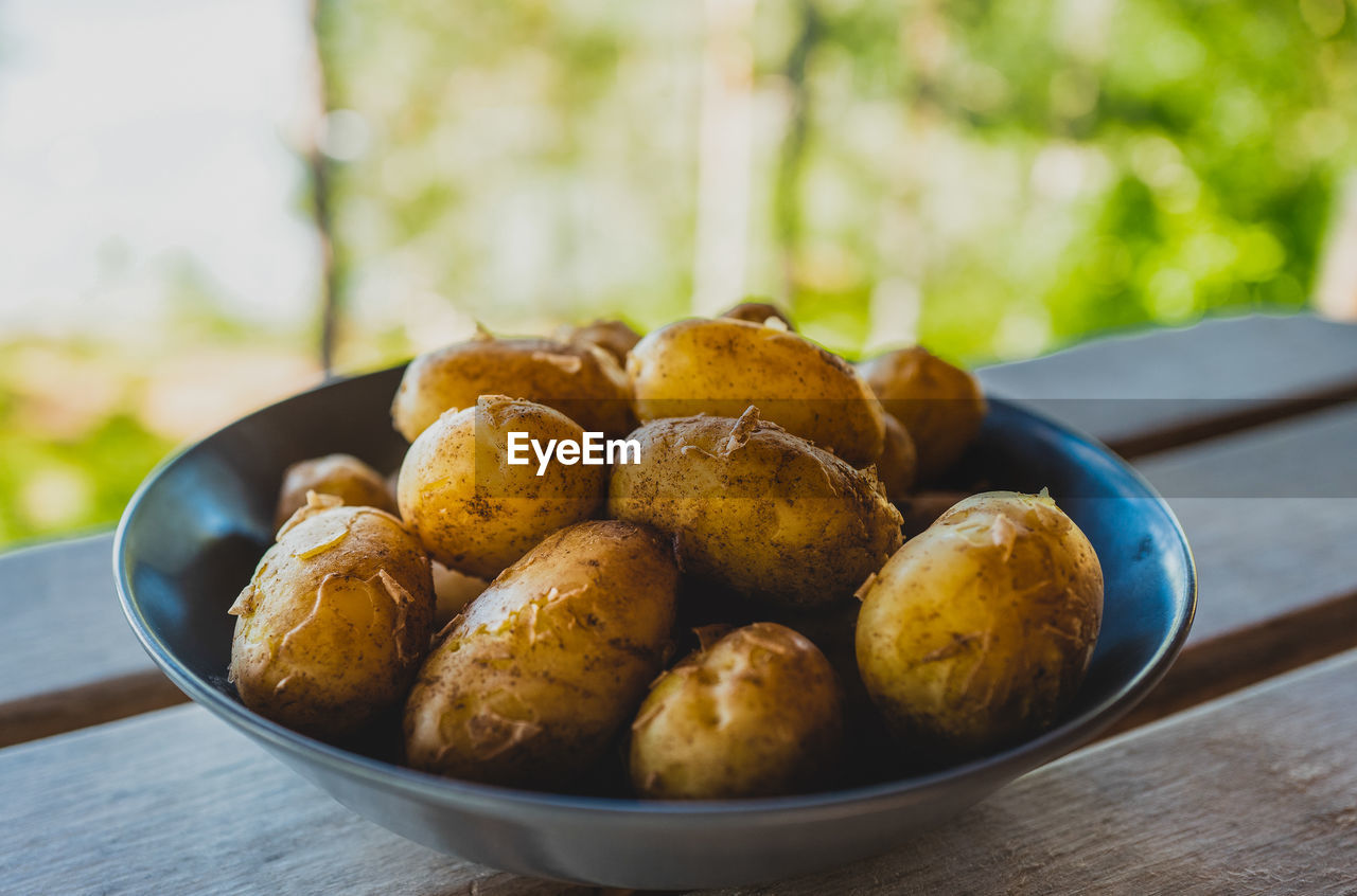 Close-up of cooked potatoes in bowl on table