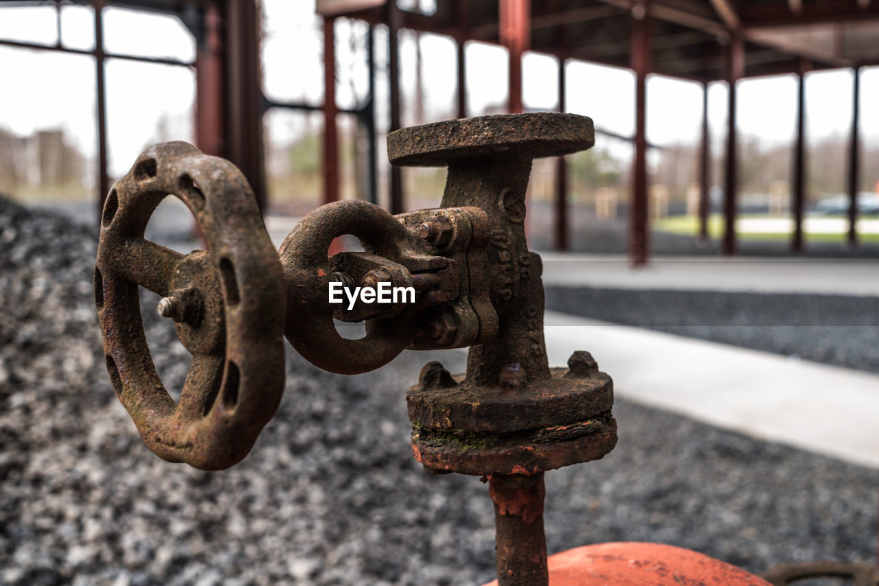 CLOSE-UP OF MACHINE PART