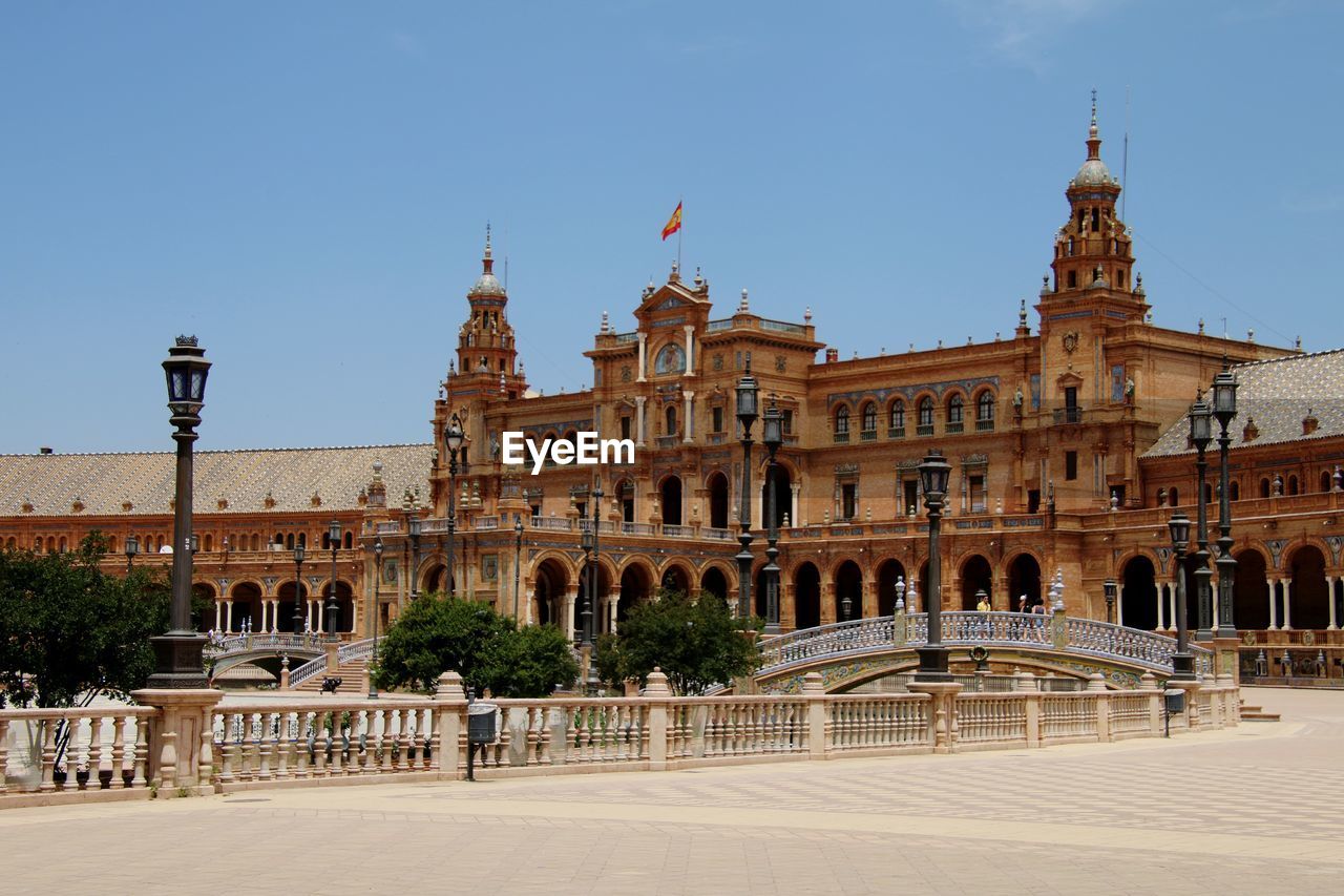 Low angle view of historic building against clear sky in spain