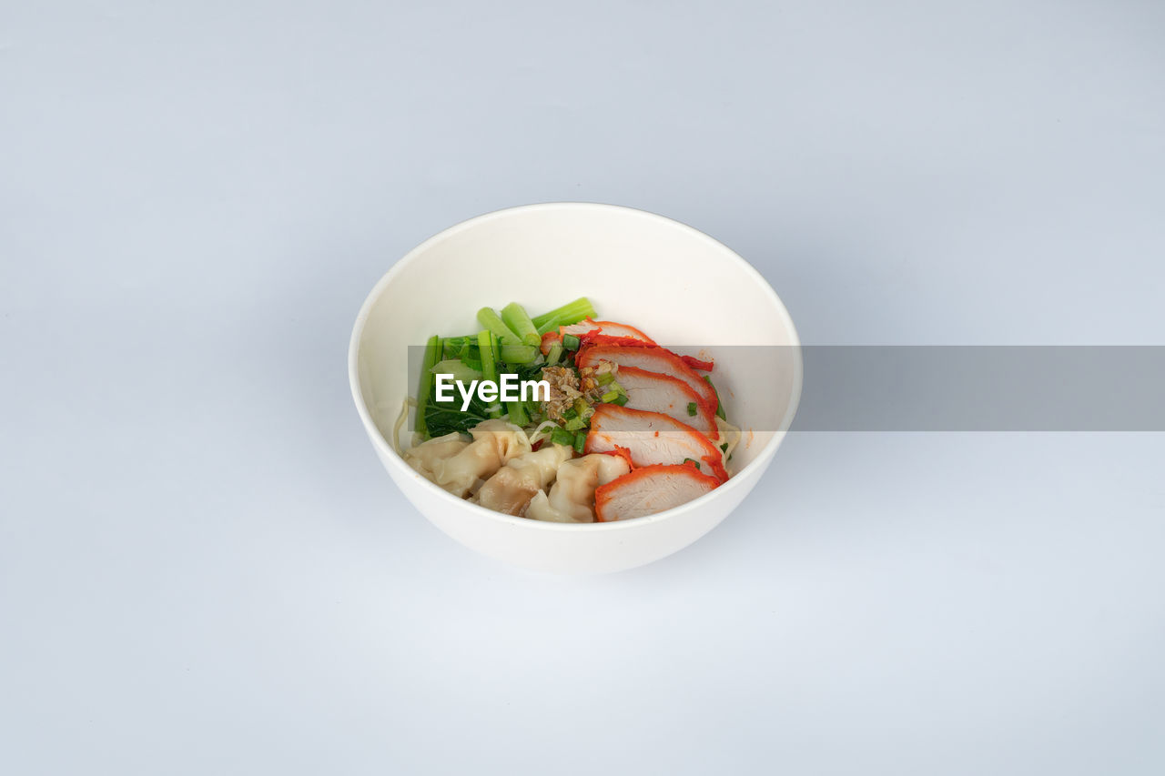 food and drink, food, healthy eating, vegetable, wellbeing, studio shot, bowl, freshness, indoors, dish, no people, herb, cuisine, produce, high angle view, plate, copy space, meat, seafood, salad, asian food, meal, tableware, plant, gray background, still life, white background