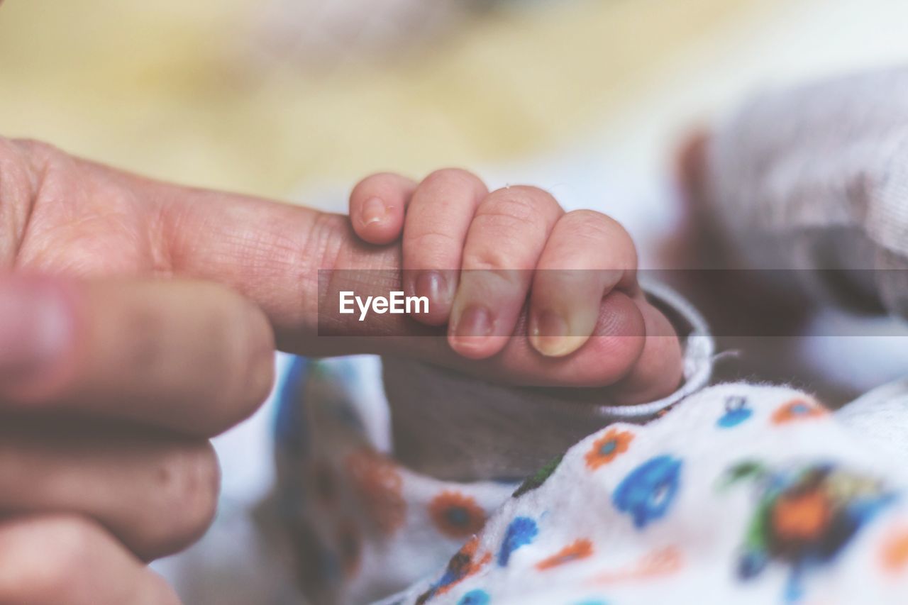 CLOSE-UP OF CHILD HANDS