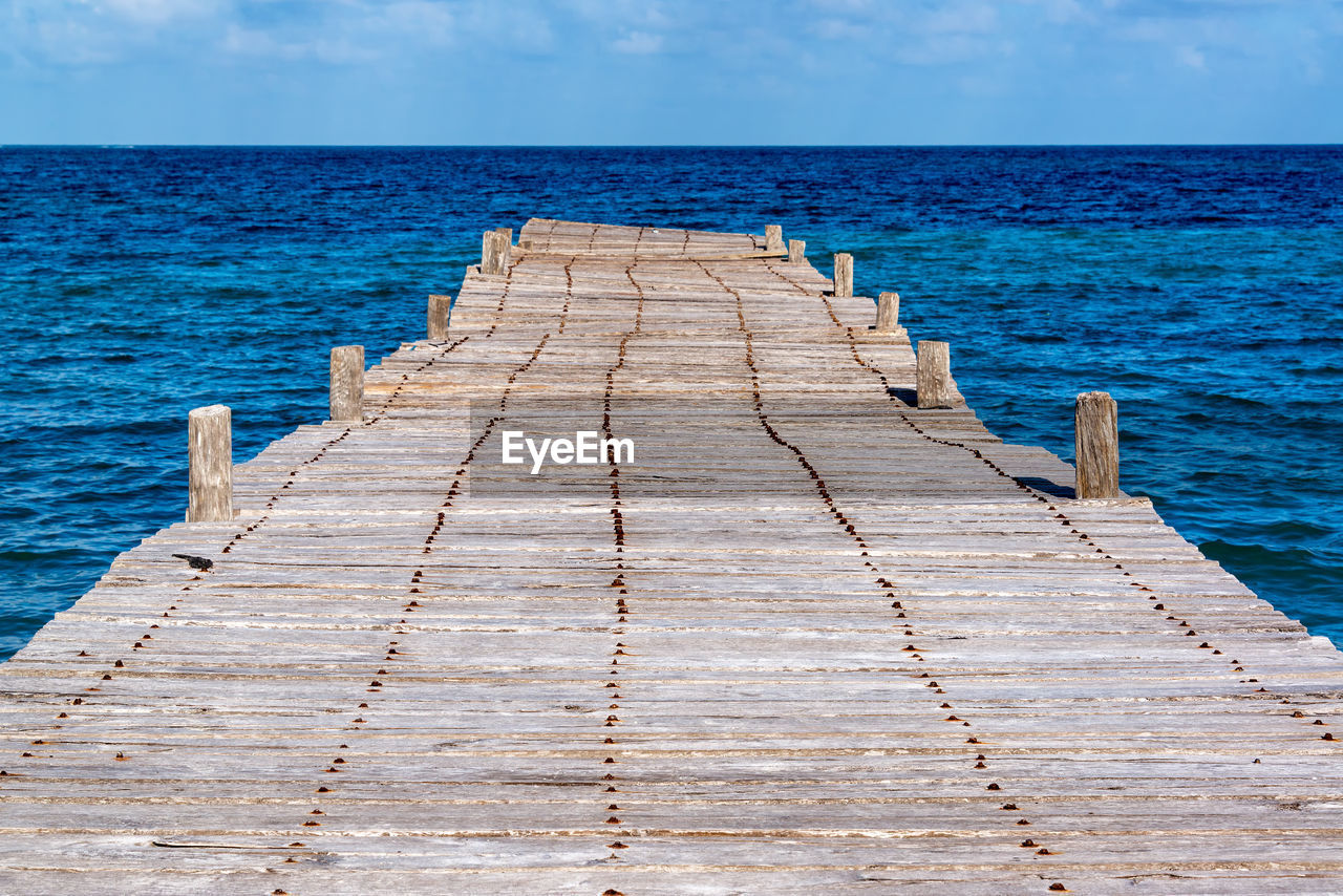 Pier against sea at sian kaan biosphere reserve