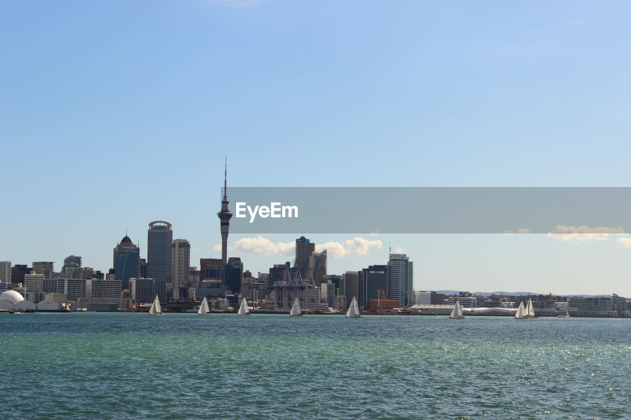 View of buildings in city at waterfront