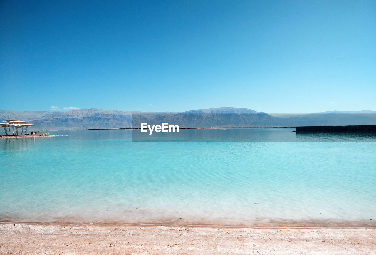 VIEW OF SEA AGAINST CLEAR BLUE SKY