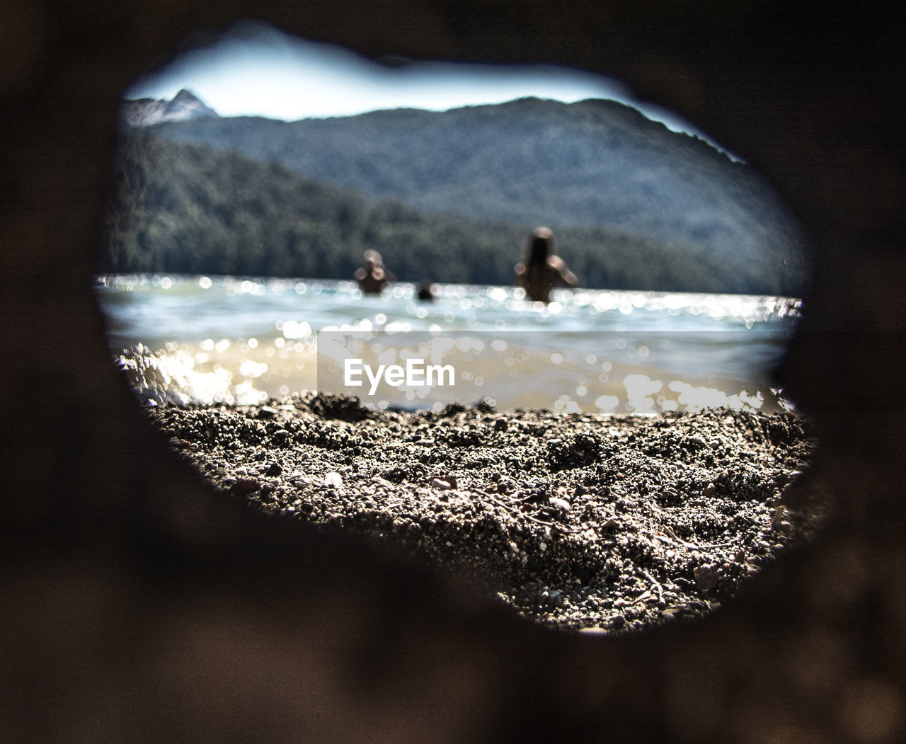 CLOSE-UP OF SEA AGAINST SKY SEEN THROUGH WATER