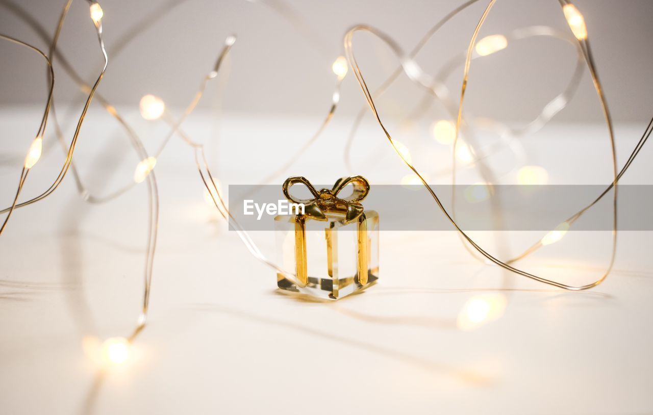 CLOSE UP OF ELECTRIC LAMP ON TABLE