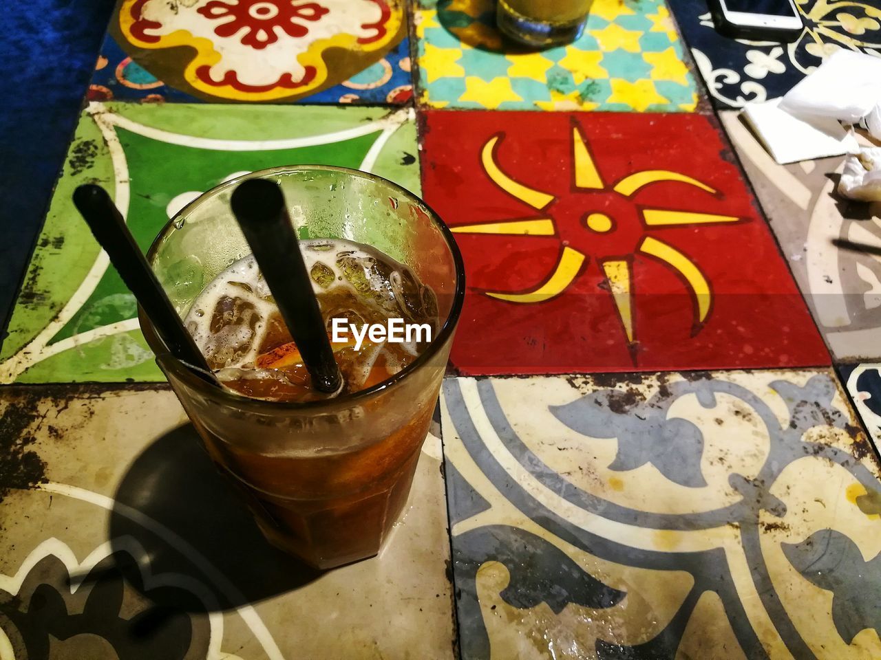 CLOSE-UP OF DRINK IN TABLE