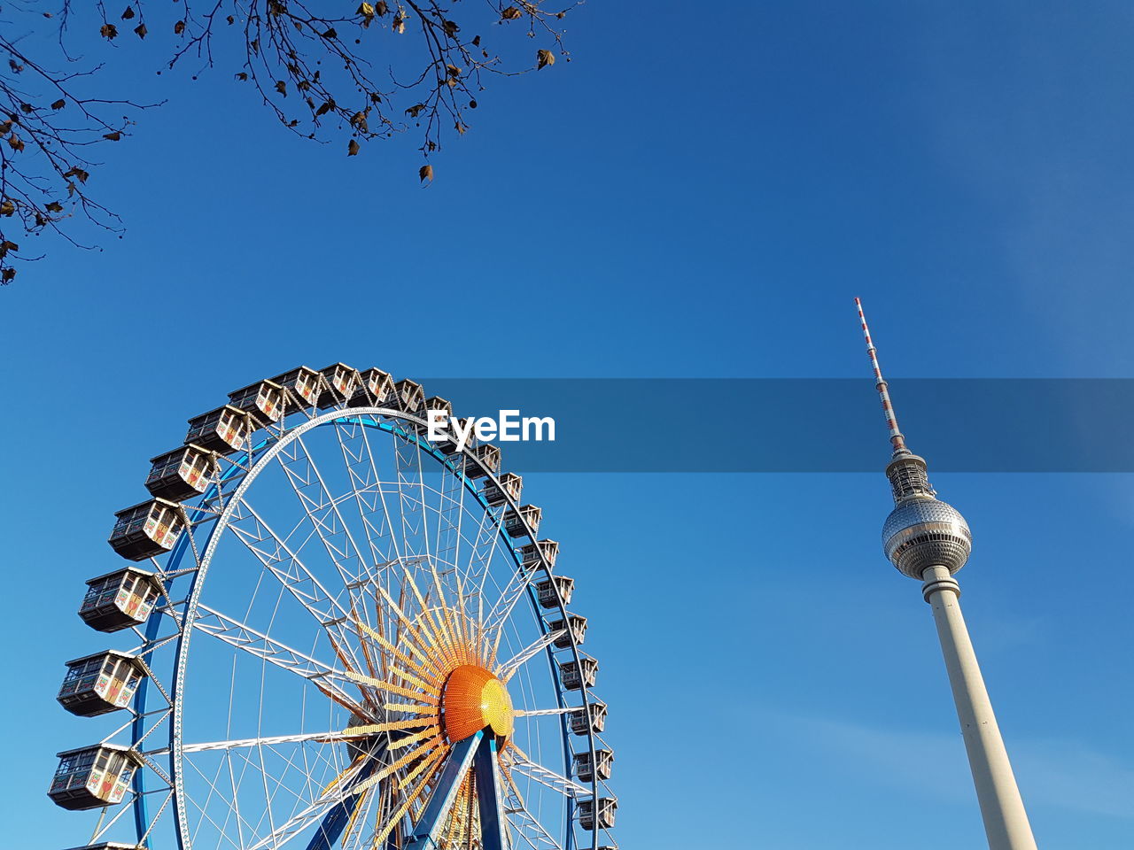LOW ANGLE VIEW OF FERRIS WHEEL AGAINST SKY