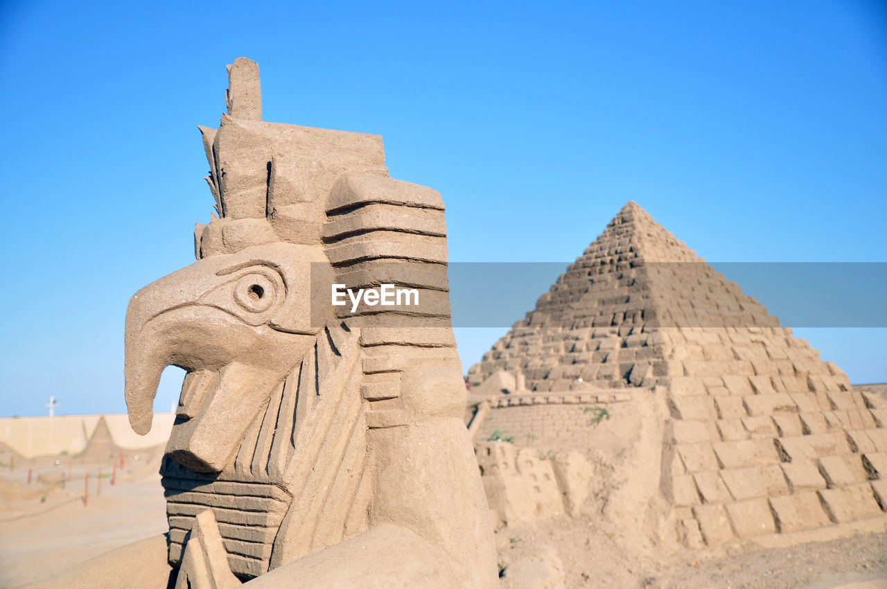 Low angle view of ancient building against sky