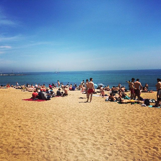 TOURISTS ON BEACH