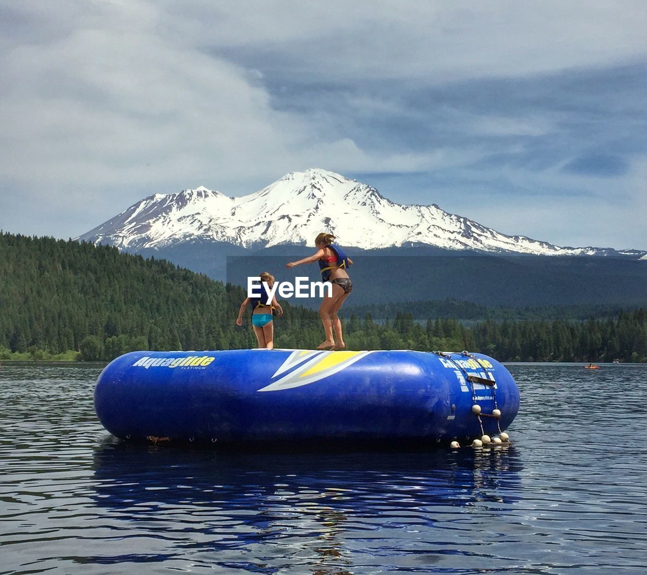 WOMAN ENJOYING IN LAKE