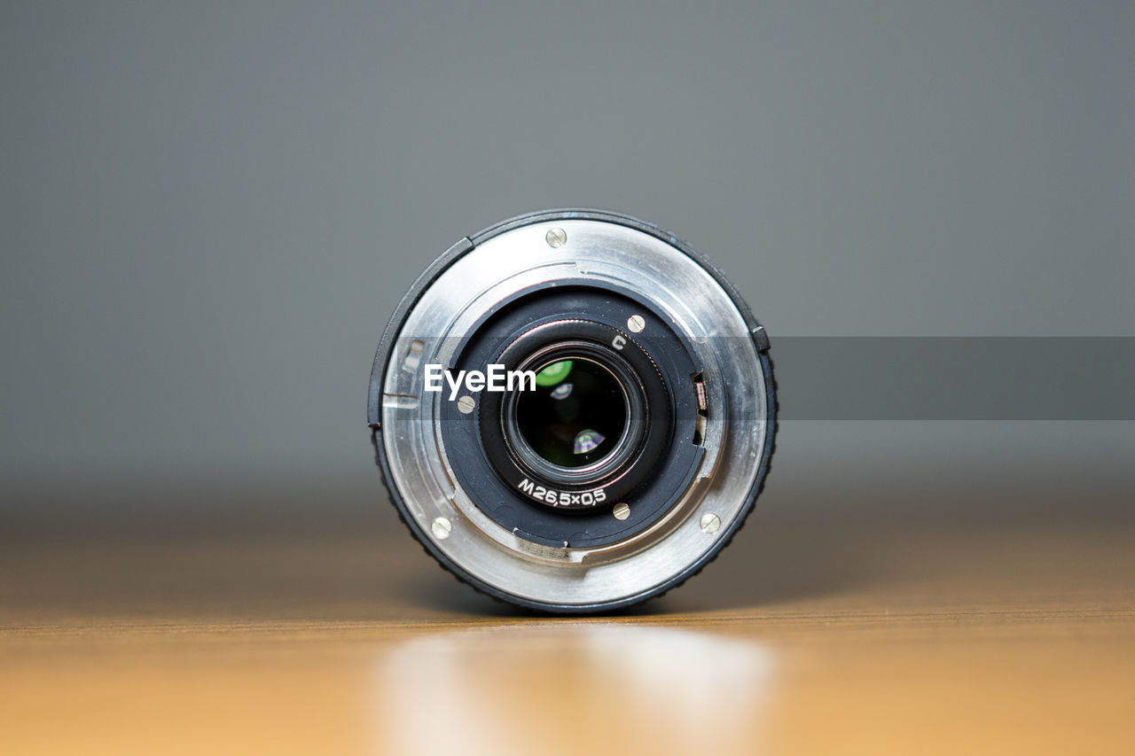 Close-up of lens on table