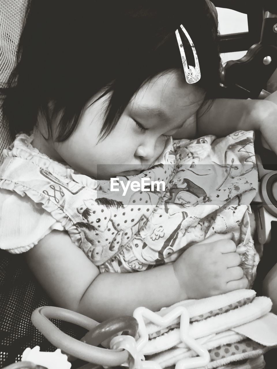 Close-up of girl lying on bed at home