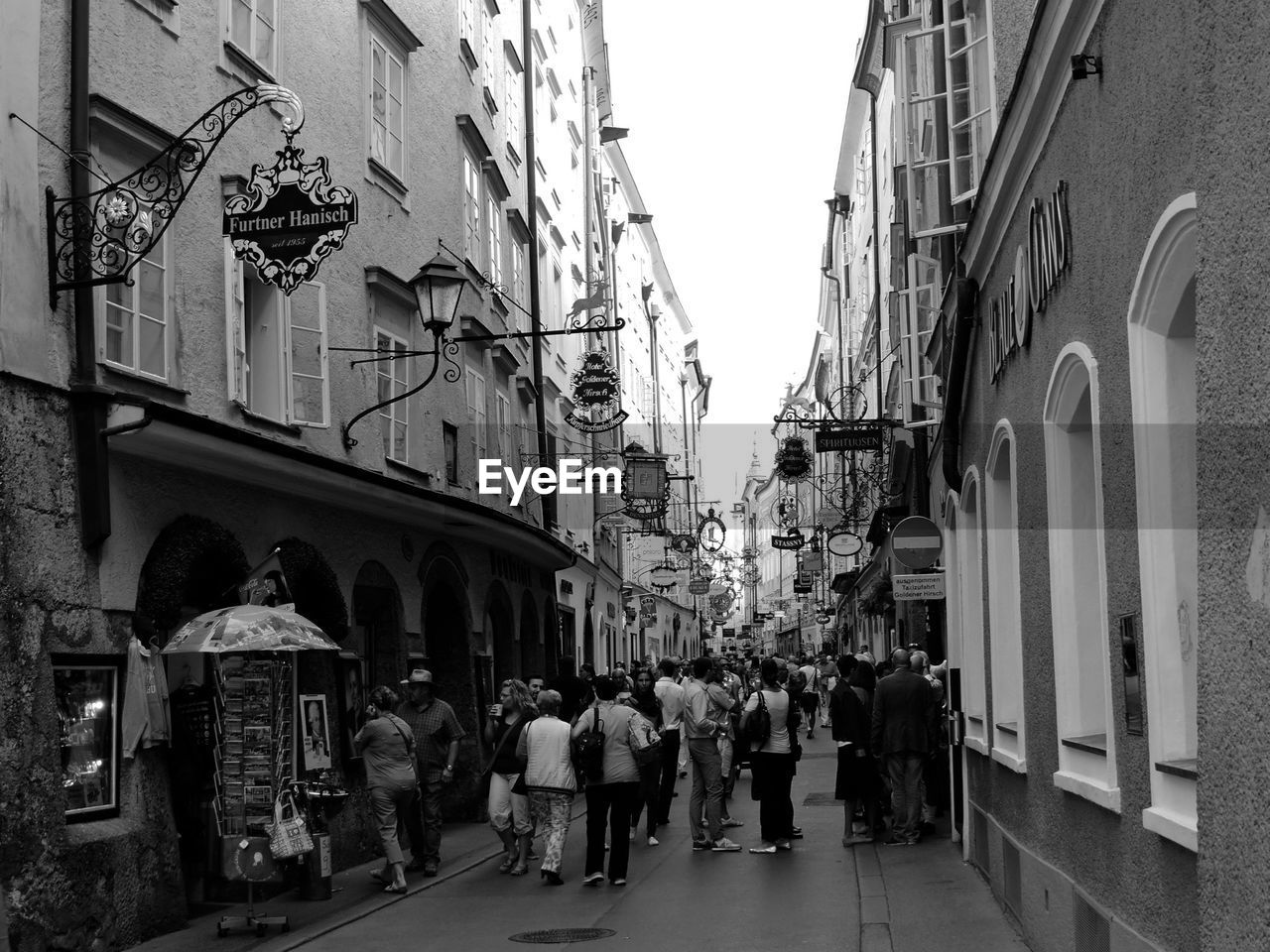 People at street amidst buildings