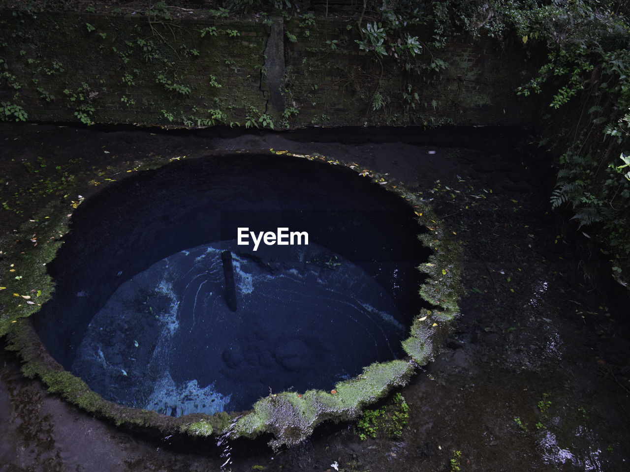 HIGH ANGLE VIEW OF WATER IN TUNNEL AT PARK