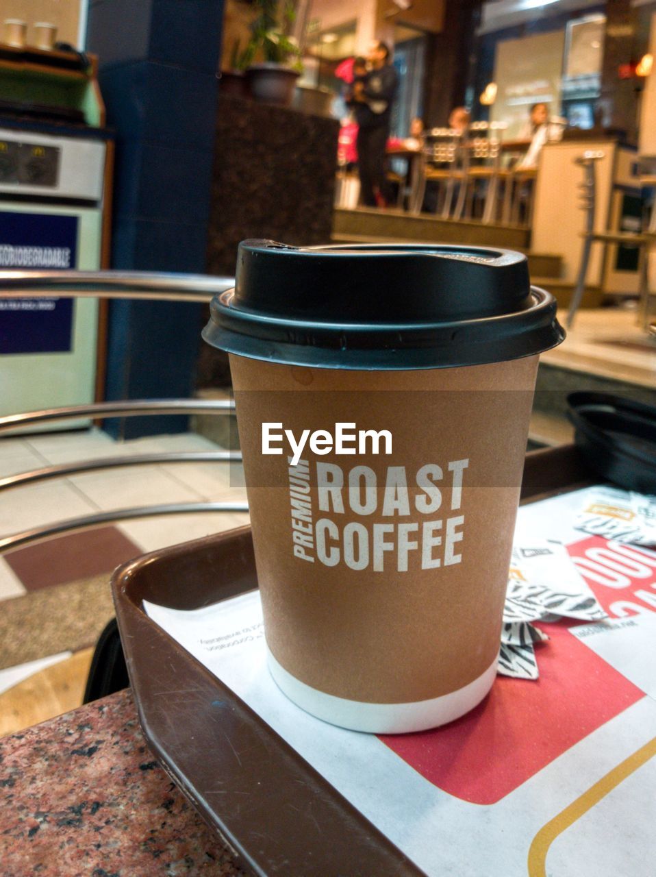 CLOSE-UP OF COFFEE CUPS ON TABLE