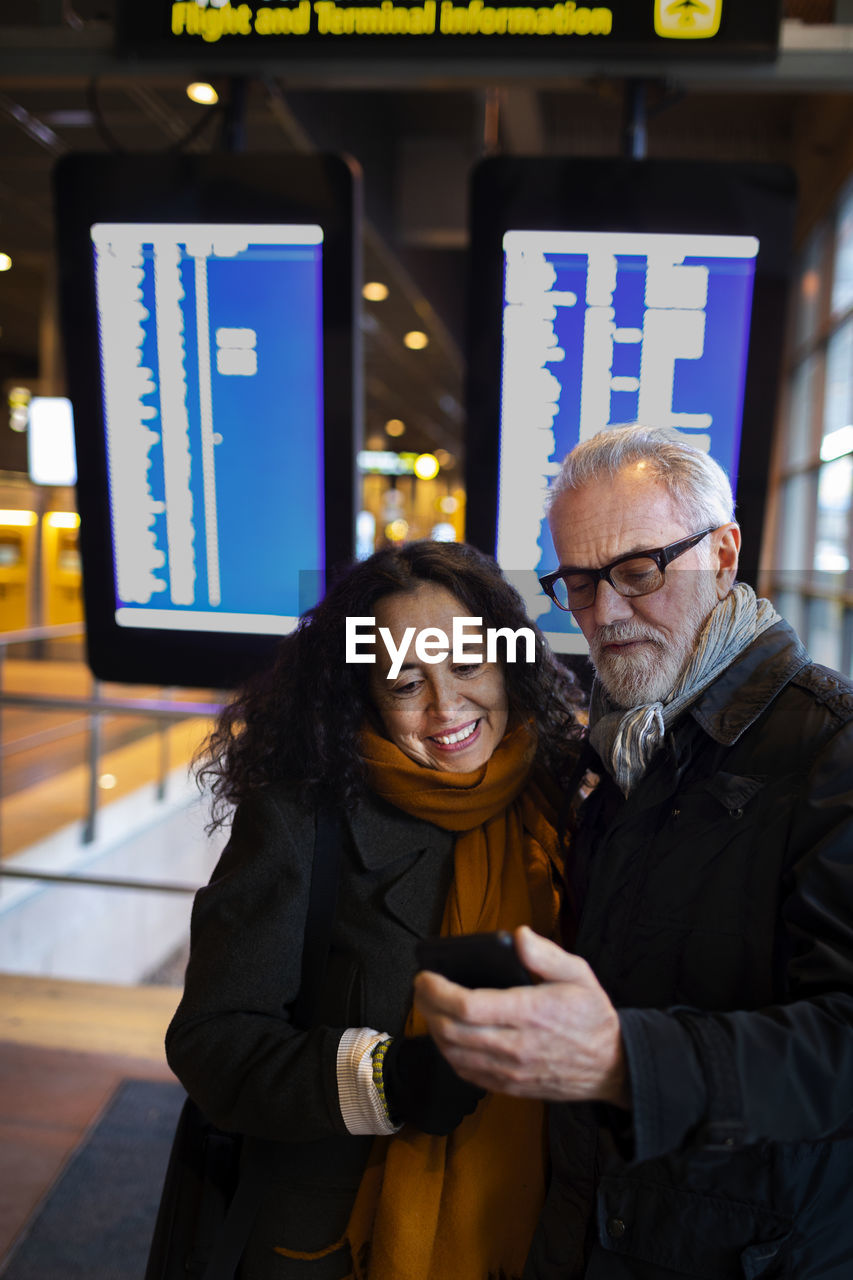 Mature couple on train station