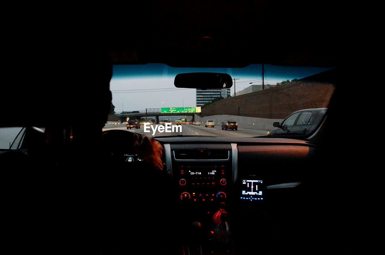 ROAD SEEN THROUGH WINDSHIELD