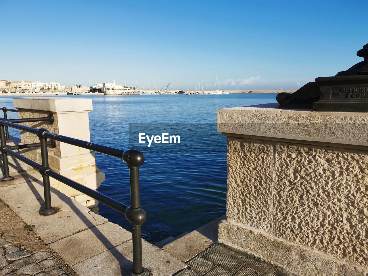 Stairs to the sea against sky