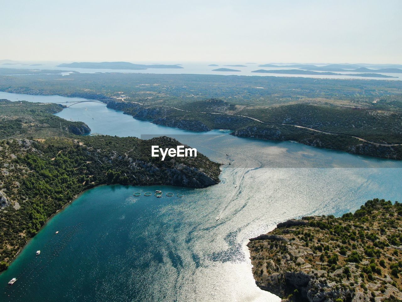 High angle view of sea shore against sky