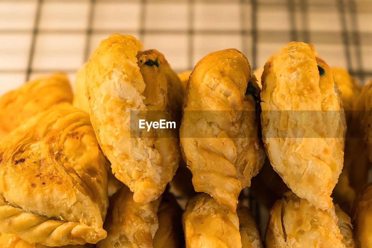 food, food and drink, freshness, close-up, no people, dish, produce, indoors, healthy eating, baked, bread, wellbeing, still life, dessert, group of objects, store, snack