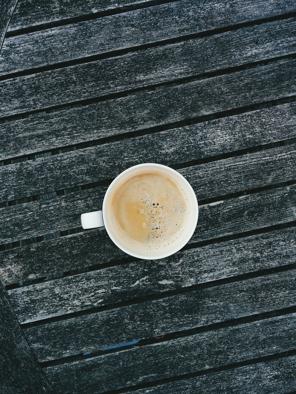 CLOSE-UP OF COFFEE CUP WITH COFFEE CUP