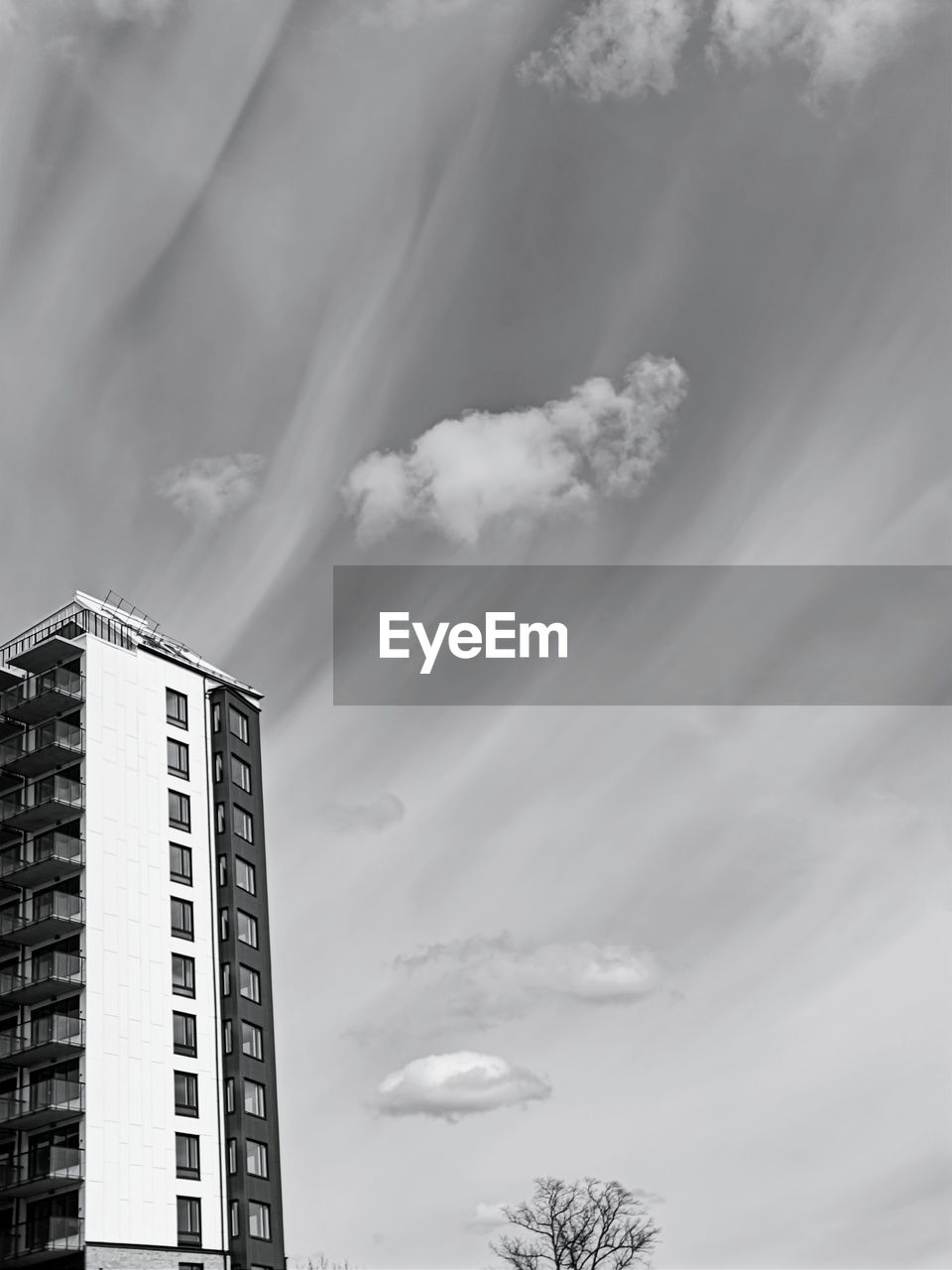 black and white, sky, monochrome photography, cloud, architecture, monochrome, building exterior, built structure, white, building, city, nature, low angle view, skyscraper, black, no people, outdoors, office building exterior, tower block, day