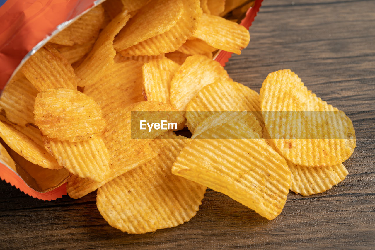 Potato chips, delicious bbq seasoning spicy for crips, thin slice deep fried snack fast food 