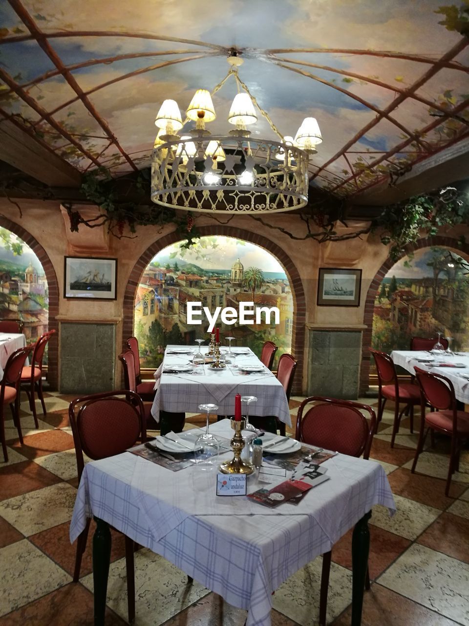 CHAIRS AND TABLE IN RESTAURANT