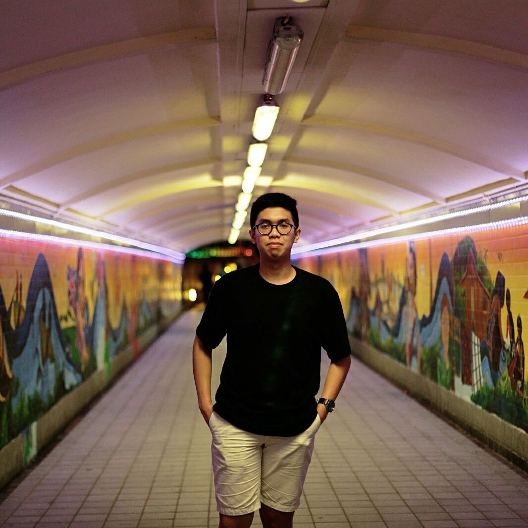 PORTRAIT OF MAN IN TUNNEL