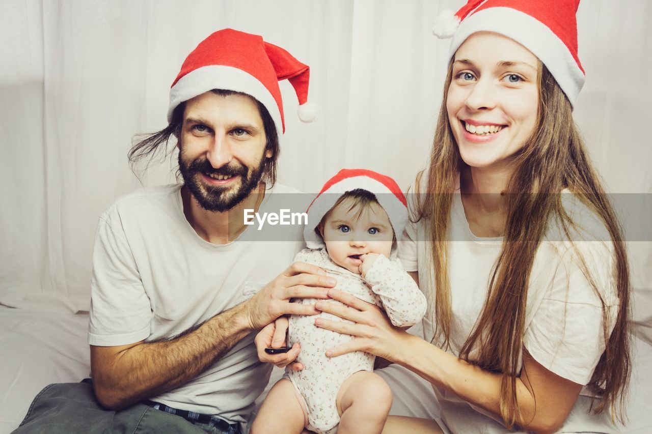 Portrait of happy family at home