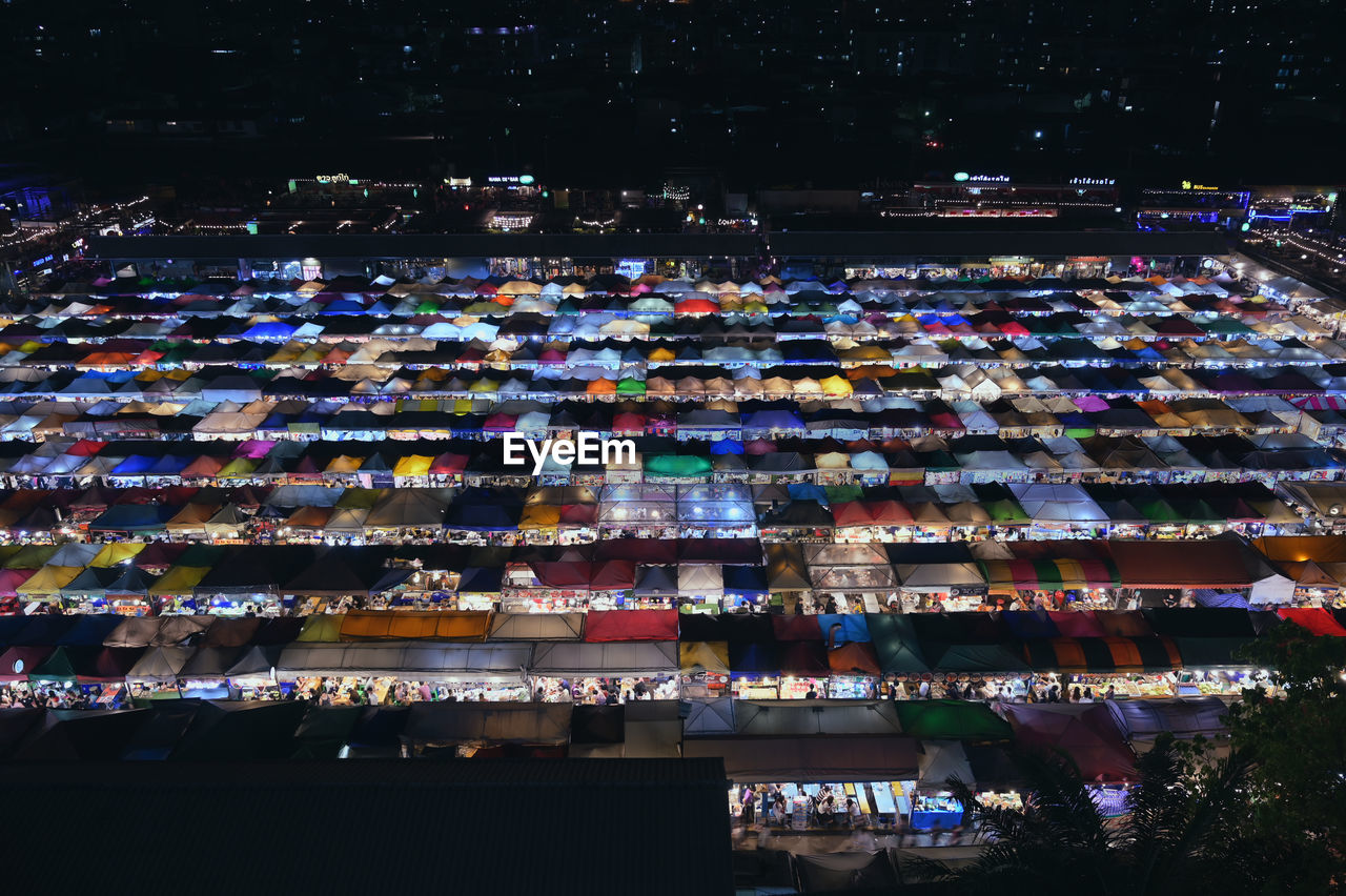 High angle view of illuminated buildings at night