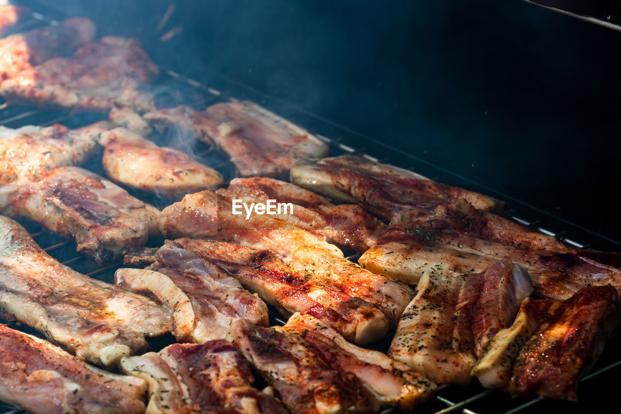 Close-up of meat on barbecue grill