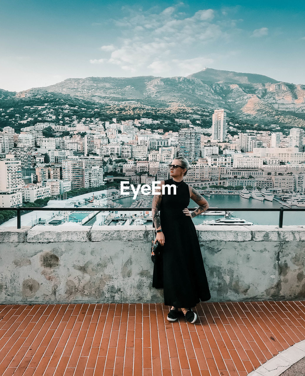 Lady in front of skyline of monaco 