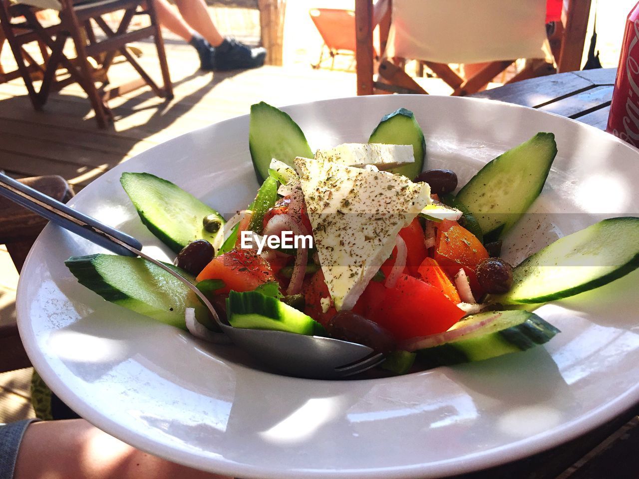 Close-up of fresh healthy salad served in restaurant