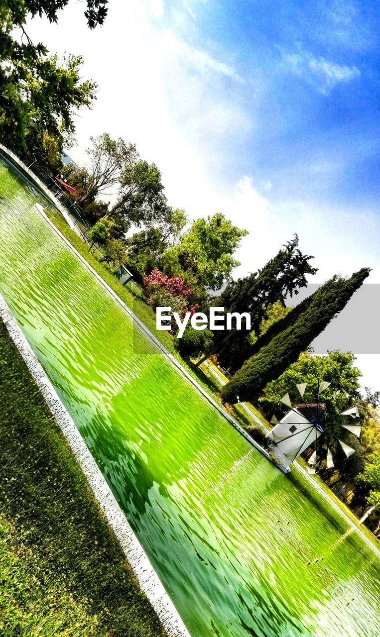 SCENIC VIEW OF GRASS AGAINST SKY