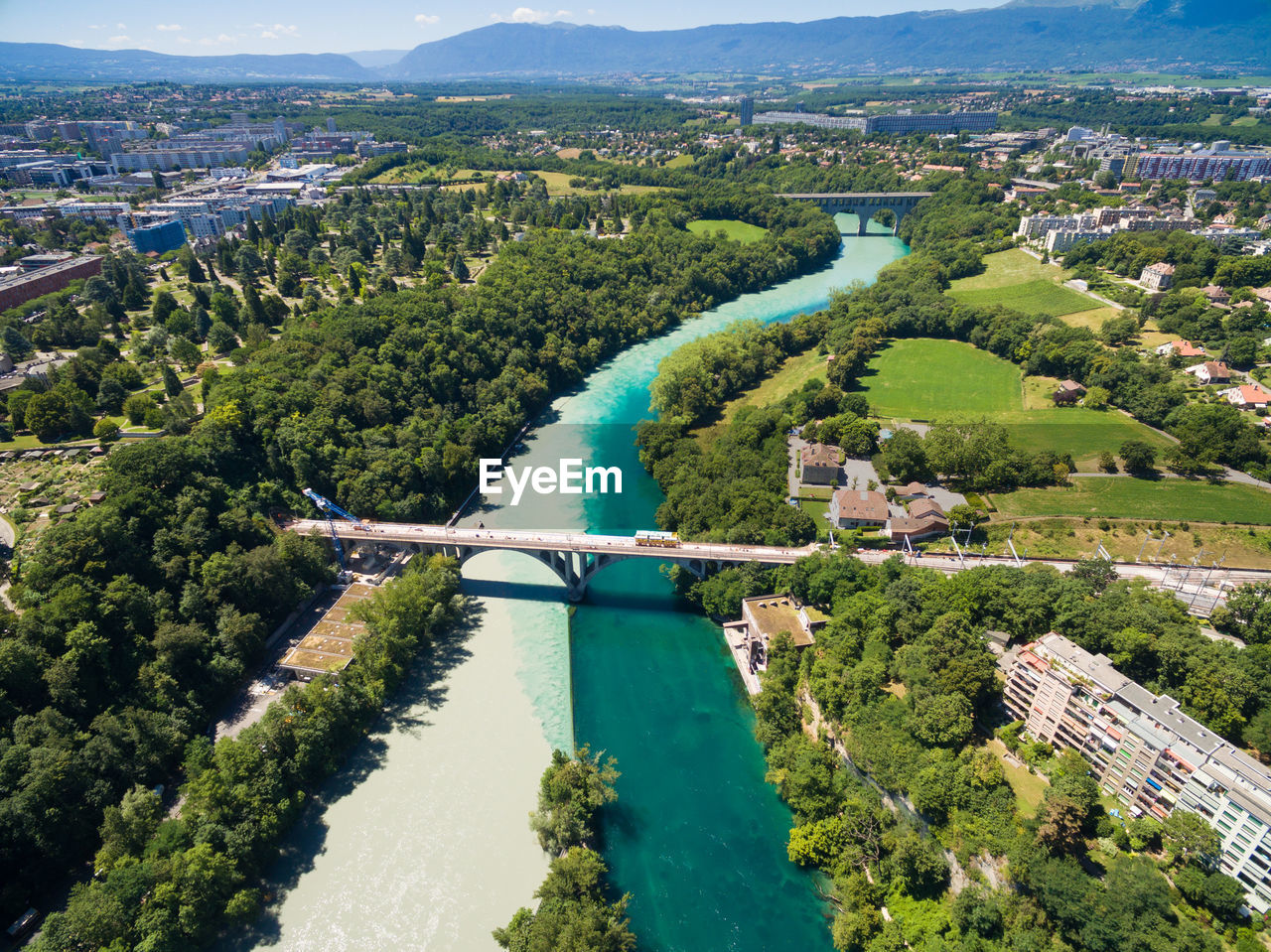 HIGH ANGLE VIEW OF RIVER AND CITYSCAPE