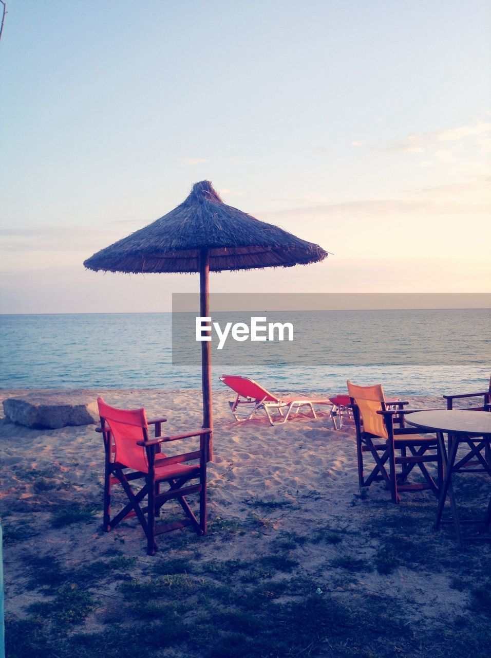 View of beach umbrellas and chairs on beach