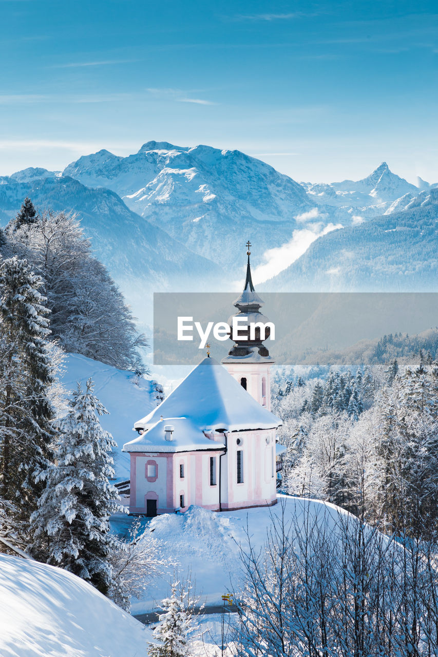 Snow covered maria gern church on mountain