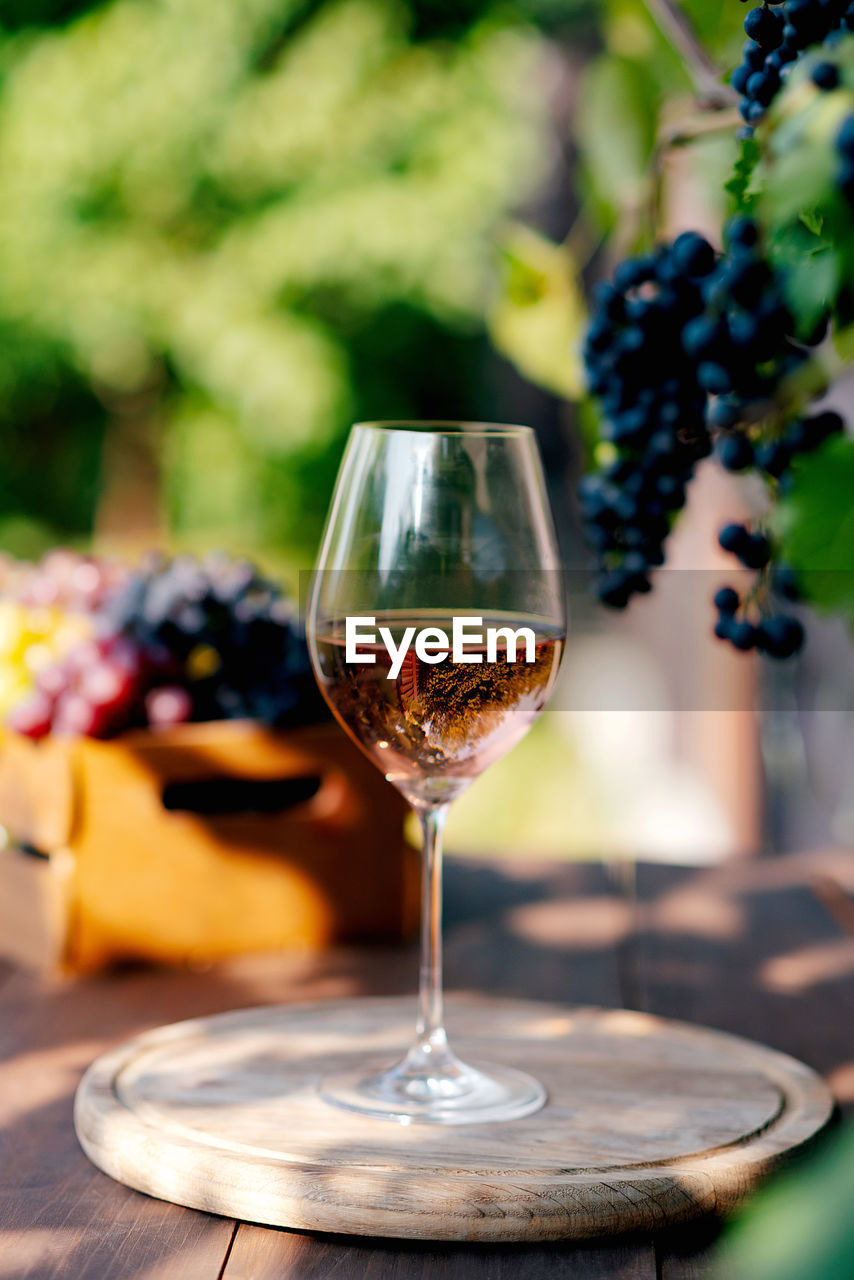 close-up of wineglasses on table