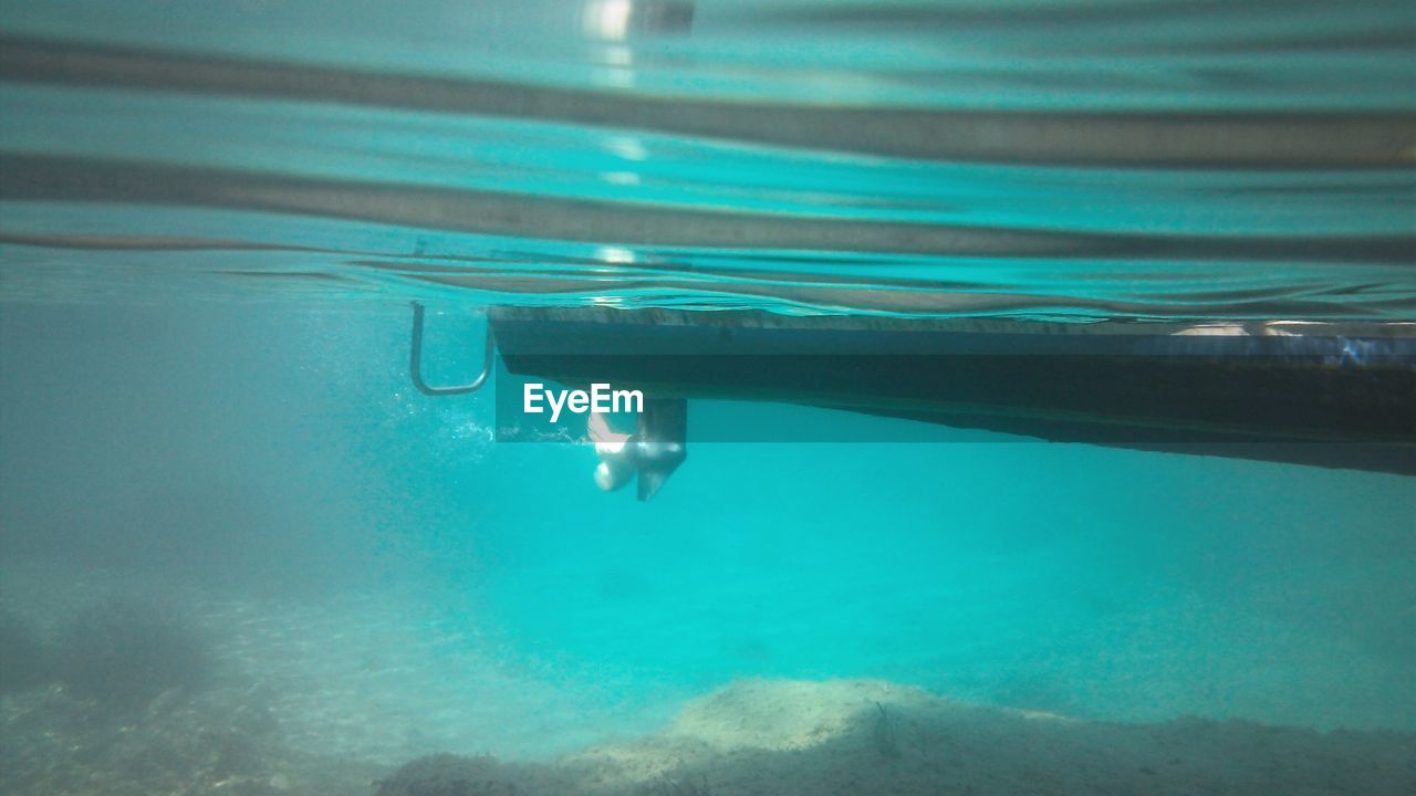 Close-up of boat bottom underwater