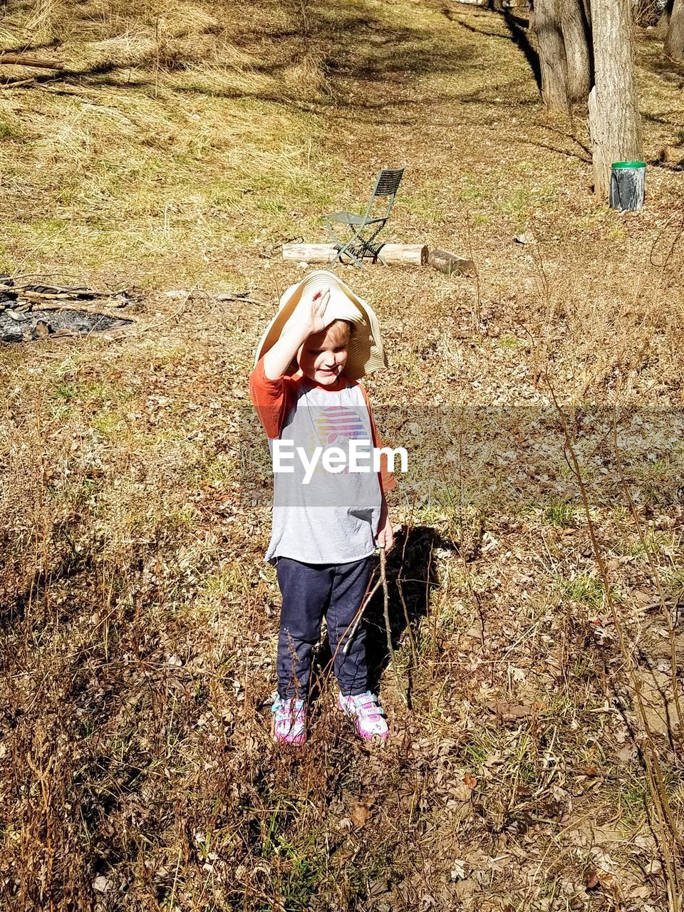 FULL LENGTH OF CHILD GIRL WITH CAMERA