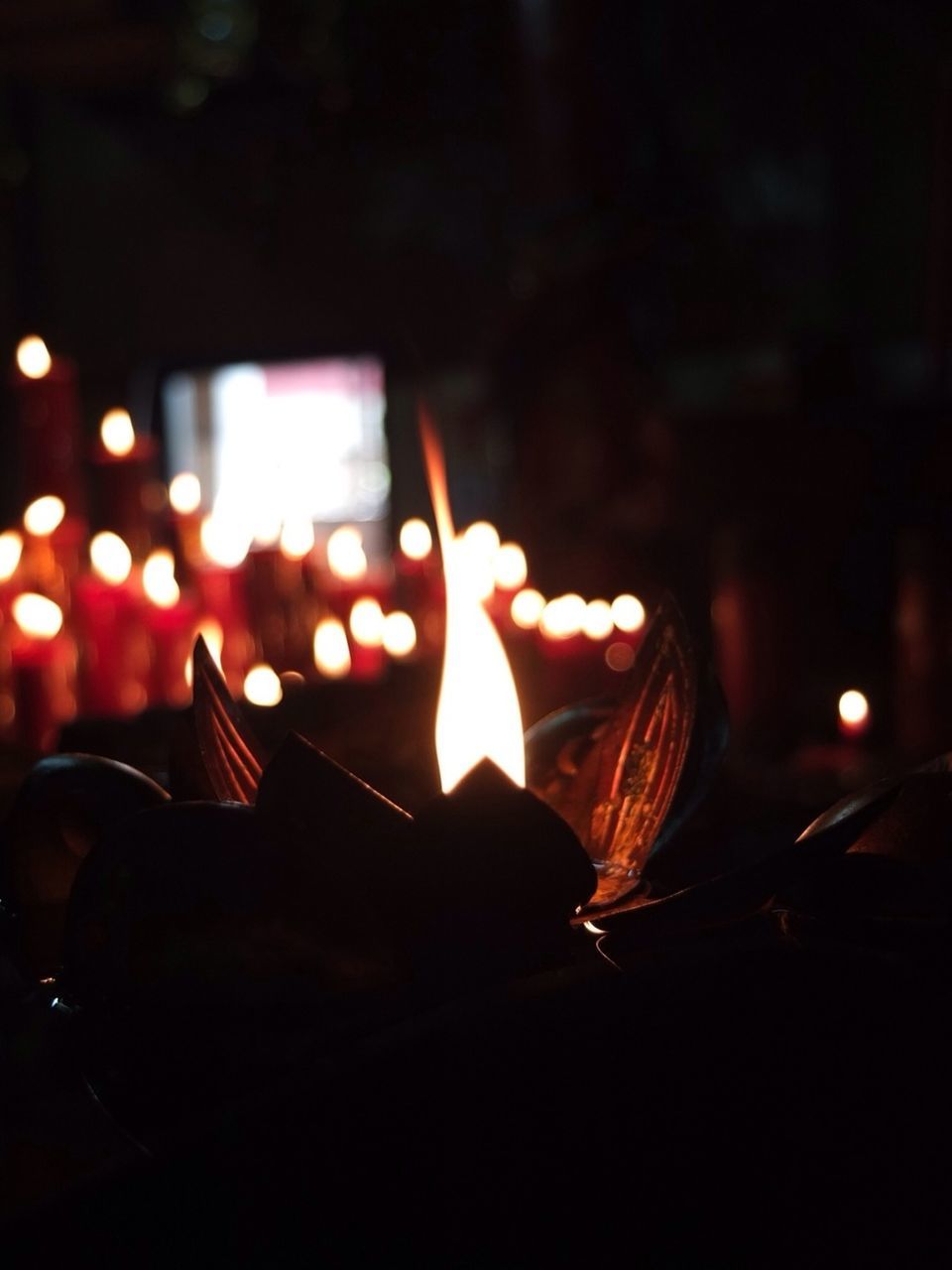 CLOSE-UP OF ILLUMINATED LIGHTS