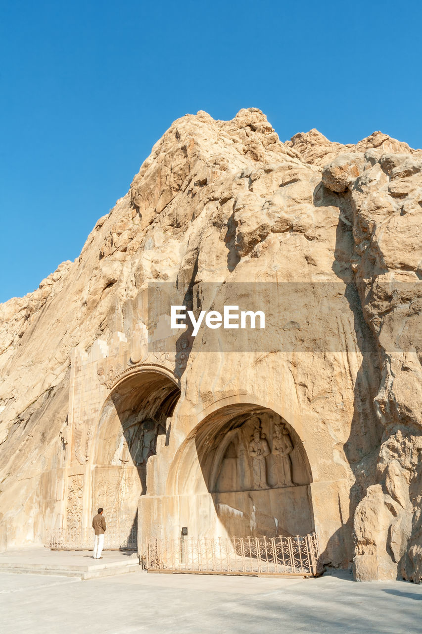 VIEW OF ROCK FORMATION AGAINST CLEAR SKY