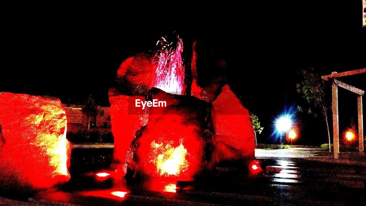 ILLUMINATED FOUNTAIN IN NIGHT