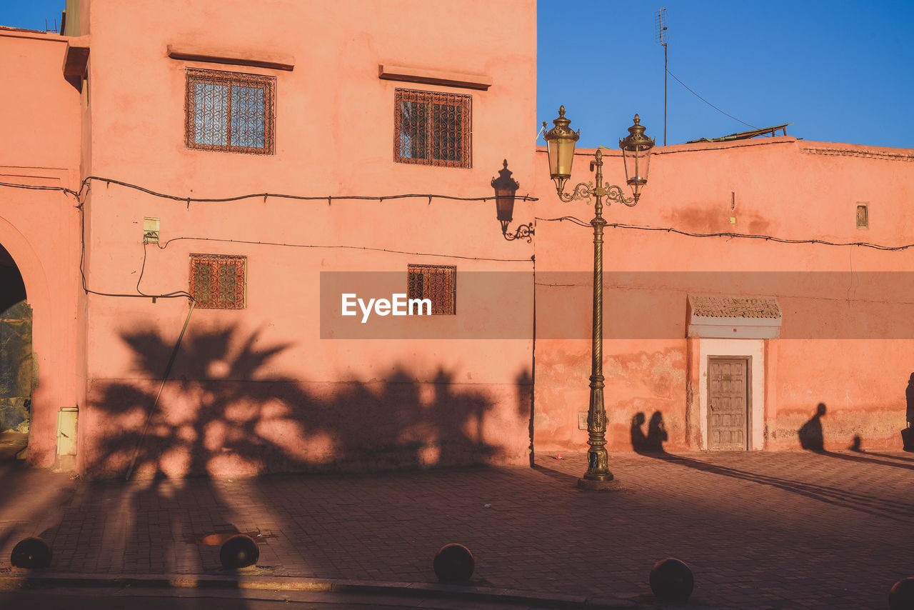 STREET AMIDST BUILDINGS IN CITY