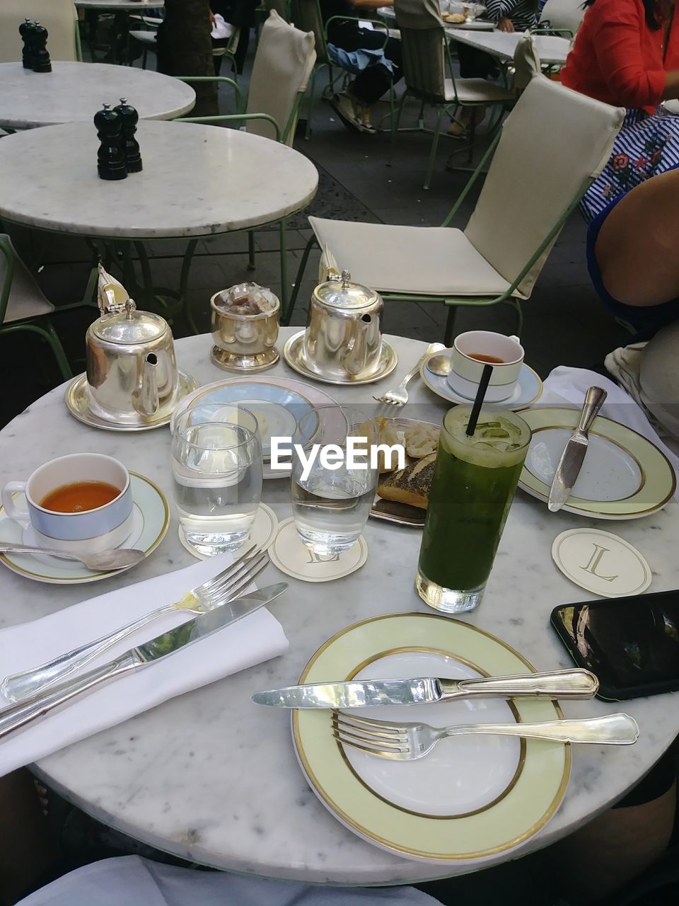 HIGH ANGLE VIEW OF WINEGLASSES ON TABLE