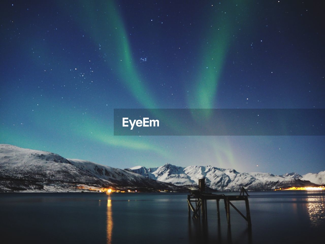 Scenic view of landscape against sky at night