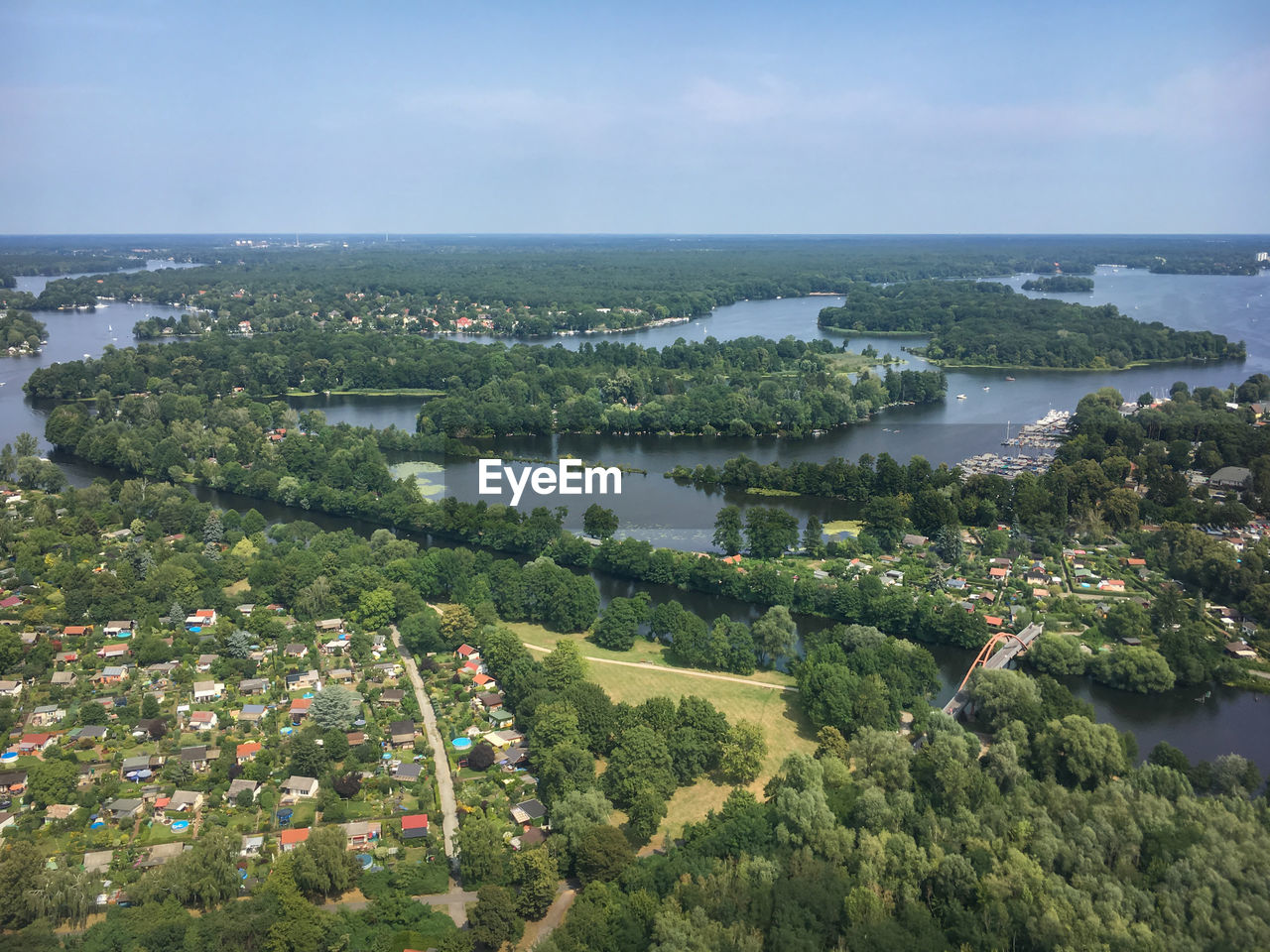 Aerial of berlin wirth districts of spandau and reinickendorf and with lake tegel against sky